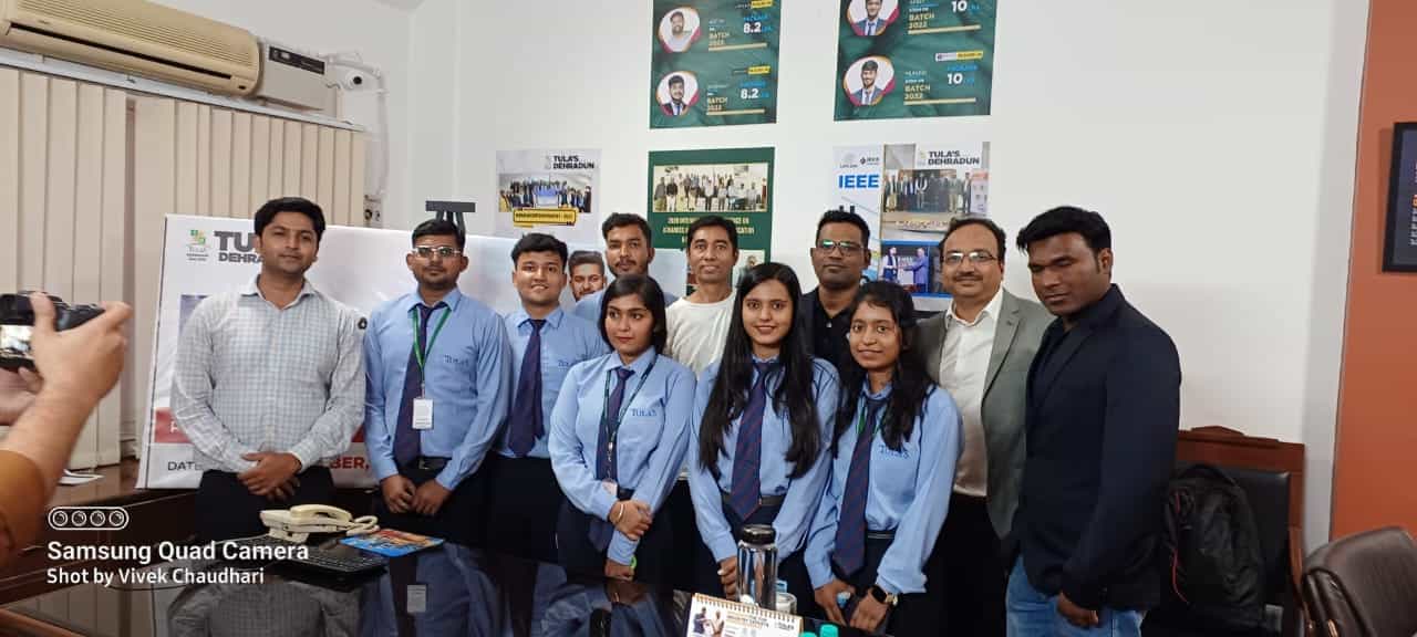 Photo of 24/7 team at a conference