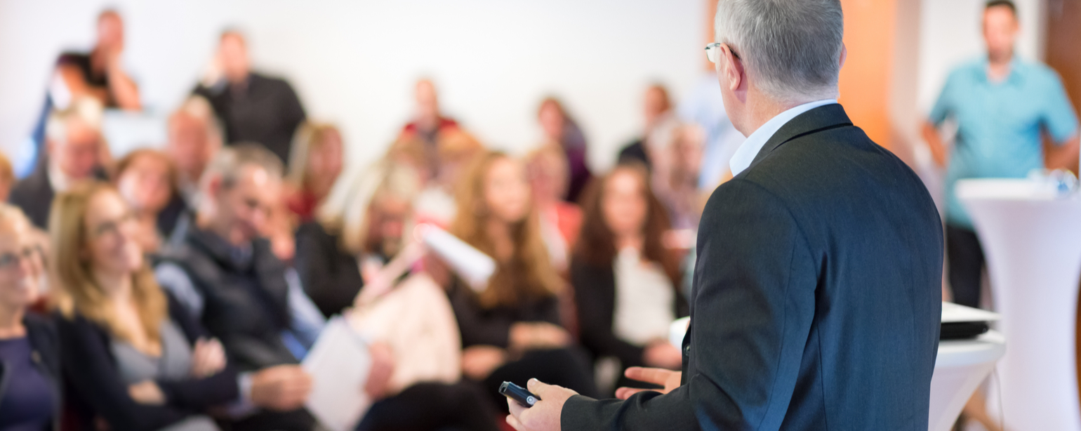 Speaker at Business Conference with Public Presentations